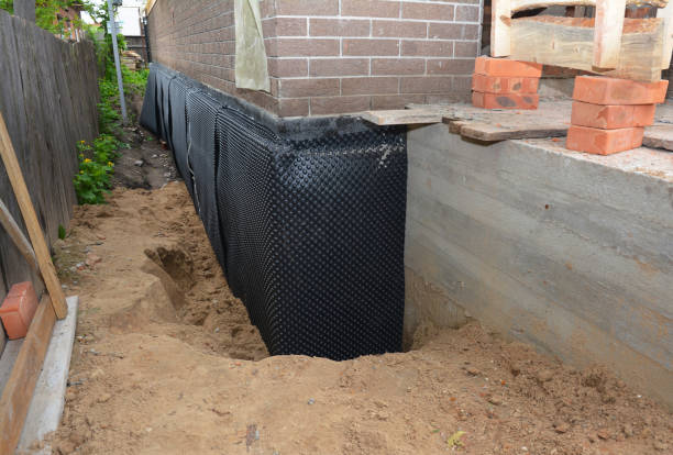 Happy homeowners after waterproofing job in West Linn